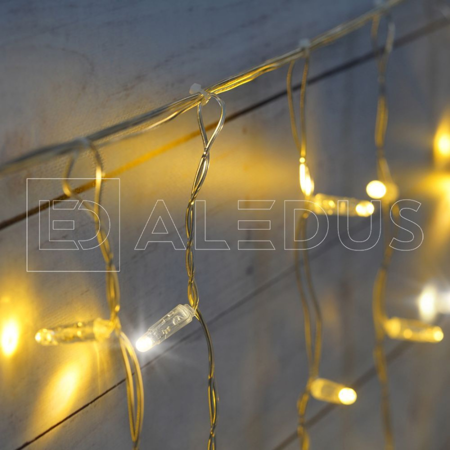 Бахрома (Айсикл) ALEDUS, 220 В, 3x0.9 м, IP65, прозрачный провод, теплый белый, с мерцанием, 144 светодиода