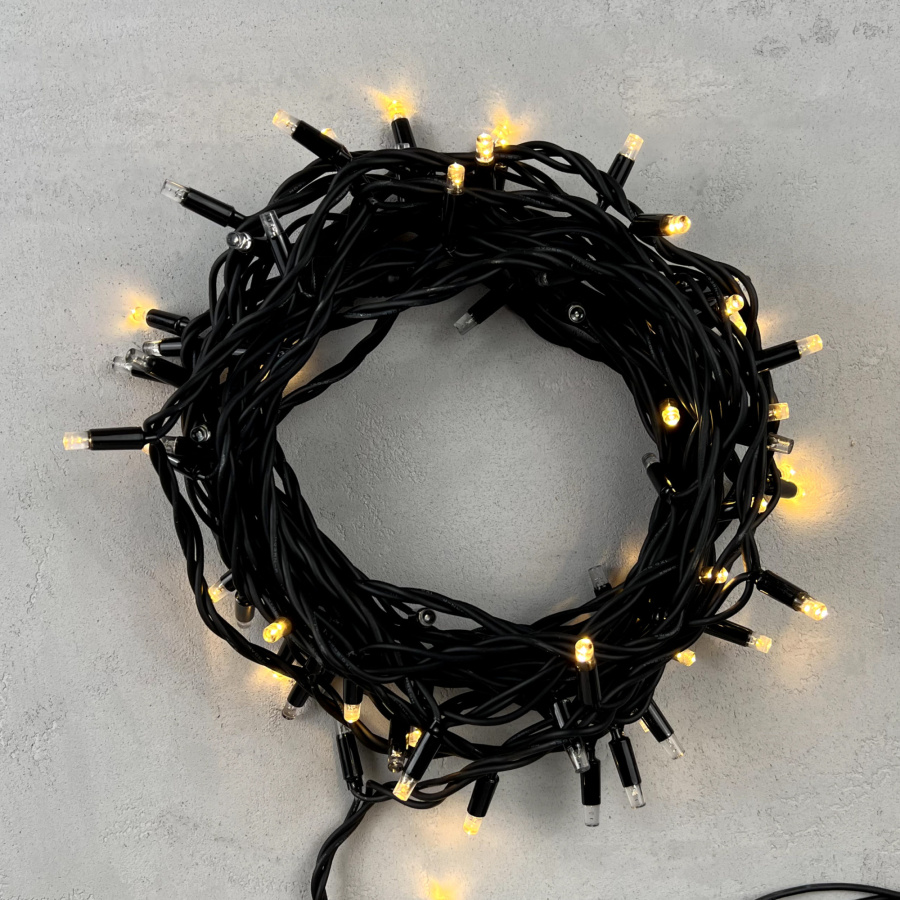 Гирлянда Нить 10м Тепло-Белая с Мерцанием Каждого Диода 220В, 75 LED, Провод Черный Каучук, IP65